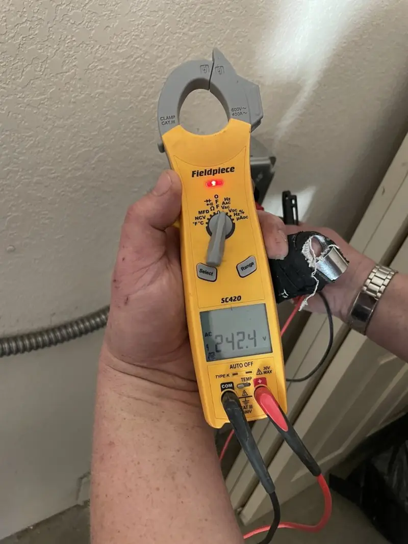 Voltage testing with clamp meter during Electrical Installation Services in West Menlo Park